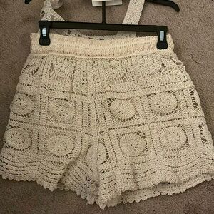 Two piece tank top/shorts set! Perfect for the beach. Never worn but no tags.